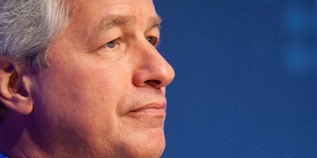 Jamie Dimon, chairman, president and chief executive officer of JPMorgan Chase & Co., listens during the Institute of International Finance Annual Membership Meeting in Washington, D.C., U.S., on Saturday, Oct. 12, 2013. The meeting will provide an overview and several perspectives on the macroeconomic environment as well as the prospects ahead for the global economy. Photographer: Pete Marovich/Bloomberg via Getty Images