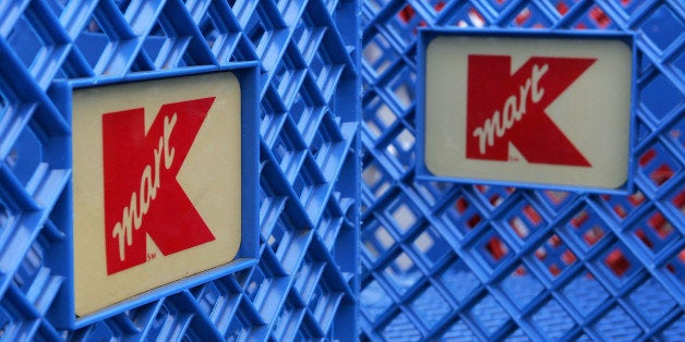 SAN MATEO, CA - MARCH 24: Shopping carts with the K-Mart logo are seen at a K-Mart store March 24, 2005 in San Mateo, California. Shareholders agreed on Kmart Holding Corp.'s $12.3 billion acquisition of Sears, Roebuck and Co., helping the two struggling rivals to combine into the nation's third-largest retailer. (Photo by Justin Sullivan/Getty Images)