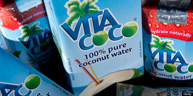 Vita Coco coconut water, manufactured by Ducoco Produtos Alimenticios S/A, is arranged for a photograph in Washington, D.C., U.S., on Wednesday, March 23, 2011. When Boston Celtics forward Kevin Garnett was rehabbing a knee injury, his new massage therapist turned him on to the benefits of an all-natural lifestyle. He began drinking coconut water, which, like sports drinks, helps athletes to replenish potassium, sodium, and electrolytes lost in sweat. Photographer: Andrew Harrer/Bloomberg via Getty Images