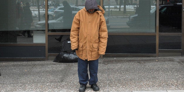 TO GO WITH AFP STORY by Joseph Krauss, US-poverty-homelessA homeless man stands in front of his belongings January 31, 2011 o