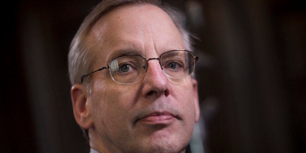 William C. Dudley, president and chief executive officer of the Federal Reserve Bank of New York, chats before an interview in New York, U.S., on Tuesday, May 21, 2013. Dudley said he has not decided whether the Fed's next move should be to enlarge or shrink its bond buying program as he called for a fresh look at its eventual retreat from record asset purchases. Photographer: Scott Eells/Bloomberg via Getty Images 