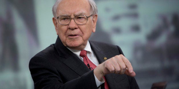 Warren Buffett, chairman and chief executive officer of Berkshire Hathaway Inc., speaks during an interview in New York, U.S., on Tuesday, Oct. 22, 2013. Warren Buffett and his late first wife, Susan, gave and pledged billions to each of their three children to fund charitable foundations. Howard, an Illinois farmer, picked global hunger as his target. Photographer: Scott Eells/Bloomberg via Getty Images 