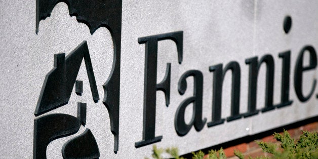 Fannie Mae signage is displayed outside of the company's headquarters in Washington, D.C., U.S., on Tuesday, April 2, 2013. Fannie Mae, the mortgage financier seized by U.S. regulators during the credit crisis, reported the largest annual profit in company history as a housing rebound helped the firm stop drawing federal aid. Photographer: Andrew Harrer/Bloomberg via Getty Images