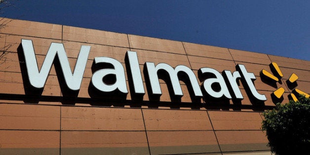 MEXICO CITY, MEXICO - APRIL 23: Wal-Mart store signage is seen from the store lot on April 23, 2012 in Mexico City, Mexico. According to reports, Wal-Mart de Mexico orchestrated a campaign of bribery to win market dominance by paying bribes to obtain permits in parts of the country. Wal-Mart Inc, along with two U.S. congressmen is conducting internal investigations over the allegations. (Photo by Daniel Aguilar/Getty Images)