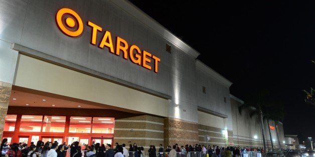 People wait in line to get an early start on Black Friday shopping deals at a Target store on November 22, 2012 in Rosemead, California, as many retailers stayed opened during the Thanksgiving celebrations, evidence that even this cherished American family holiday is falling prey to the forces of commerce. AFP PHOTO / Frederic J. BROWN (Photo credit should read FREDERIC J. BROWN/AFP/Getty Images)