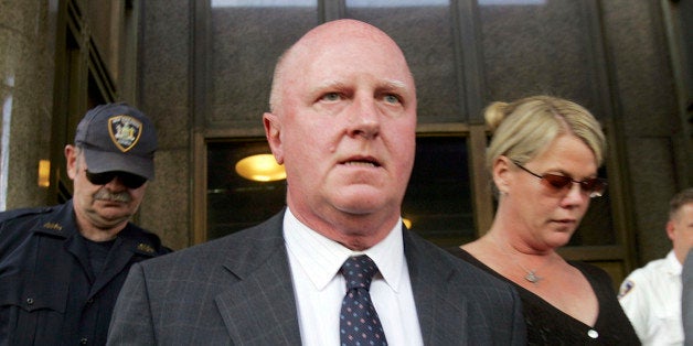 NEW YORK - JUNE 17: Former Tyco chief executive L. Dennis Kozlowski (C) leaves the Manhattan Criminal Court after being found guilty on all but one charge June 17, 2005 in New York City. Kozlowski and former Tyco finance chief Mark Swartz were accused of taking $542.4 million in unauthorized bonuses in the form of cash, shares and company loan reductions. Swartz and Kozlowski are on trial for the second time after the first case ended in a mistrial when a juror said she had been threatened. (Photo by Spencer Platt/Getty Images)