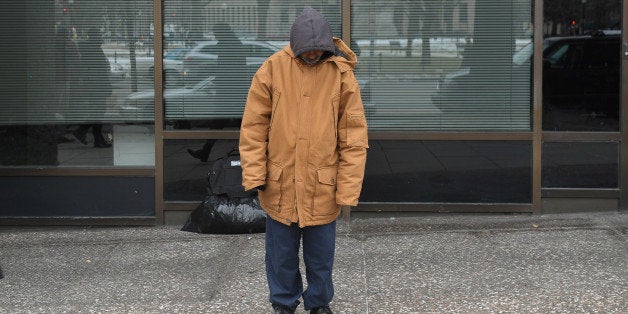 TO GO WITH AFP STORY by Joseph Krauss, US-poverty-homelessA homeless man stands in front of his belongings January 31, 2011 o