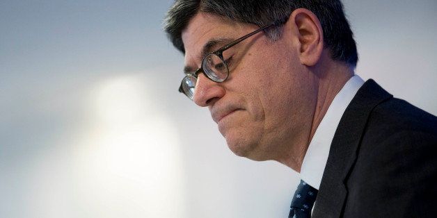 Jacob 'Jack' Lew, U.S. Treasury secretary, pauses while speaking at the Pew Charitable Trusts in Washington, D.C., U.S., on Thursday, Dec. 5, 2013. Lew said the Volcker rule banning banks' proprietary trading that regulators plan to vote on next week will prohibit transactions such as JPMorgan Chase & Co.'s so-called London Whale and put more responsibility on top Wall Street executives. Photographer: Andrew Harrer/Bloomberg via Getty Images 