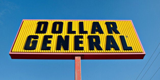 Dollar General Corp. signage is displayed outside of a store in Princeton, Illinois, U.S., on Tuesday, Sept. 3, 2013. Dollar General Corp. is scheduled to release earnings figures on Sept. 4. Photographer: Daniel Acker/Bloomberg via Getty Images