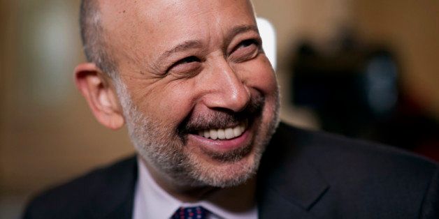 Bloomberg's Best Photos 2013: Lloyd Blankfein, chairman and chief executive officer of Goldman Sachs Group Inc., smiles during a Bloomberg Television interview in San Francisco, California, U.S., on Tuesday, Feb. 12, 2013. Blankfein discussed the role of technology in innovation across different industries, the impact of the financial crisis on investment banking, and his plans to remain at with the company. Photographer: David Paul Morris/Bloomberg via Getty Images 