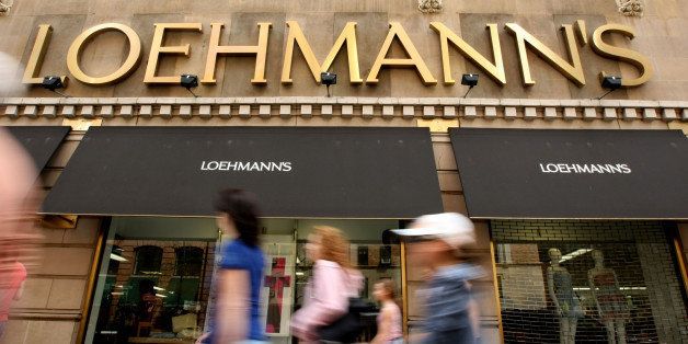Pedestrians walk past Loehmann's department store in the Chelsea neighborhood of New York, U.S., on Tuesday, April 6, 2010. Suppliers to the clothing retailer have begun to stop shipments due to the store's deteriorating finances, the New York Post reported. Photographer: Jin Lee/Bloomberg via Getty Images