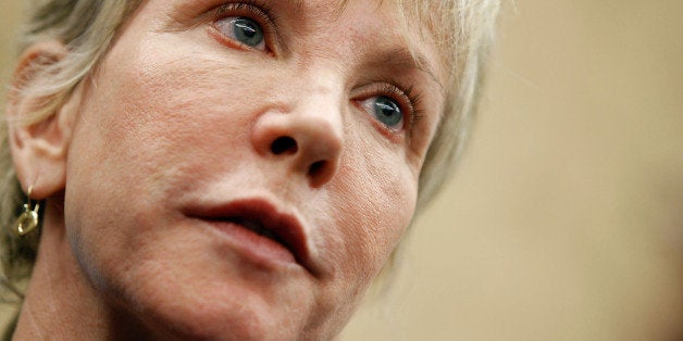 WASHINGTON - OCTOBER 26: America's Health Insurance Plans President and CEO Karen Ignagni answers questions from reporters after a forum hosted by the Congressional Health Care Caucus on Capitol Hill October 26, 2009 in Washington, DC. The caucus, a group that serves Republican members of Congress, hosted the forum to talk about how best to insure individuals with 'pre-existing conditions.' (Photo by Chip Somodevilla/Getty Images)