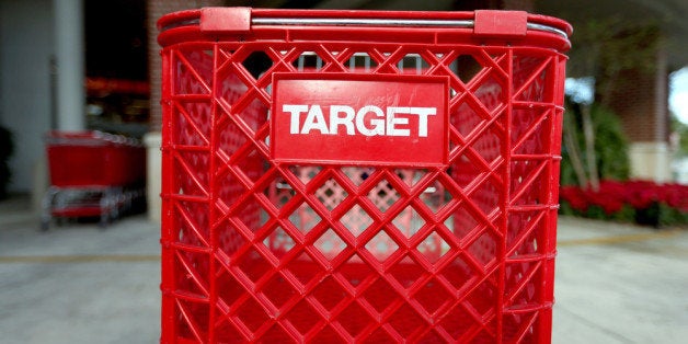 MIAMI, FL - DECEMBER 19: Carts are seen outside of a arget store on December 19, 2013 in Miami, Florida. Target announced that about 40 million credit and debit card accounts of customers who made purchases by swiping their cards at terminals in its U.S. stores between November 27 and December 15 may have been stolen. (Photo by Joe Raedle/Getty Images)