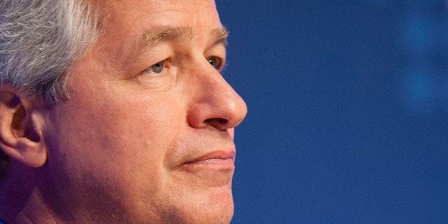 Jamie Dimon, chairman, president and chief executive officer of JPMorgan Chase & Co., listens during the Institute of International Finance Annual Membership Meeting in Washington, D.C., U.S., on Saturday, Oct. 12, 2013. The meeting will provide an overview and several perspectives on the macroeconomic environment as well as the prospects ahead for the global economy. Photographer: Pete Marovich/Bloomberg via Getty Images