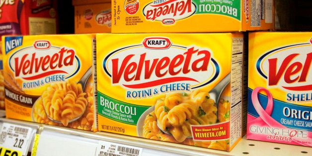 Boxes of Kraft Foods Inc.'s velveeta rotini & cheese sit on display at a grocery store in Raleigh, North Carolina, U.S., on Sunday, Nov. 8, 2009. Kraft Foods Inc., the maker of Oreos and Ritz crackers, stuck to its initial bid in an unsolicited offer to buy Cadbury Plc for 9.8 billion pounds ($16 billion) that may make it the world's largest confectioner. Photographer: Jim R. Bounds/Bloomberg
