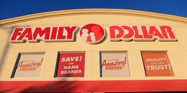 Family Dollar Stores Inc. signage is displayed outside a store location in Mansfield, Texas, U.S., on Tuesday, Jan. 7, 2014. Family Dollar Stores Inc. is expected to release quarterly earnings results on Jan. 9. Photographer: Ben Torres/Bloomberg via Getty Images