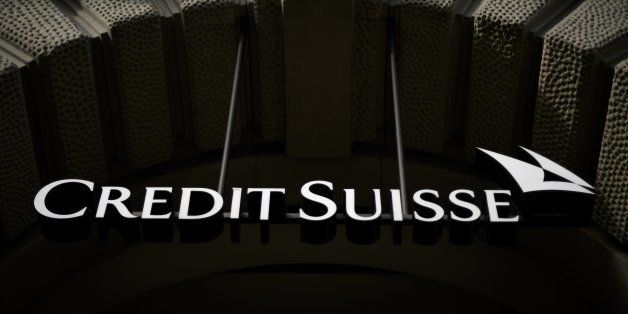 The sign of Swiss banking giant Credit Suisse is seen on November 2, 2013 in Zurich. AFP PHOTO / FABRICE COFFRINI (Photo credit should read FABRICE COFFRINI/AFP/Getty Images)