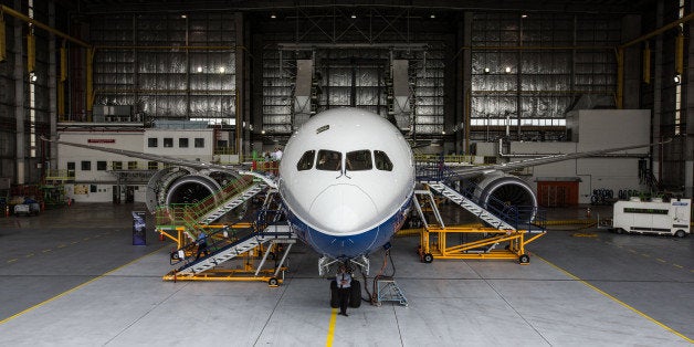 A Boeing Co. 787-9 Dreamliner test aircraft stands in a hangar at Air New Zealand Ltd.'s technical operations base at Auckland International Airport in Auckland, New Zealand, on Sunday, Jan. 5, 2014. Boeing's 787-9, a stretched version of its marquee Dreamliner, took its first flight last October and is expected to begin service for Air New Zealand Ltd. by mid-2014 after it completes flight testing and certification. Photographer: Brendon O'Hagan/Bloomberg via Getty Images