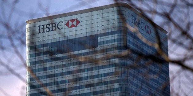 This picture taken on March 4, 2013 shows the UK headquarters of HSBC at Canary Wharf in London. Asia-focused bank HSBC said on March 4, 2013 that net profits sank 16.5 percent to $14.03 billion in 2012, hit by US money-laundering fines, mis-selling scandals, rising taxation and a huge accounting charge. Profit after tax fell to the equivalent of 10.78 billion euros last year, compared with $16.8 billion in 2011, London-headquartered HSBC said in a results statement. Pre-tax profits meanwhile slid six percent to $20.65 billion. AFP PHOTO / ANDREW COWIE (Photo credit should read ANDREW COWIE/AFP/Getty Images)