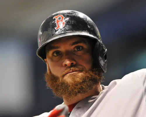 Local Red Sox fan sporting trademark beard in support of team