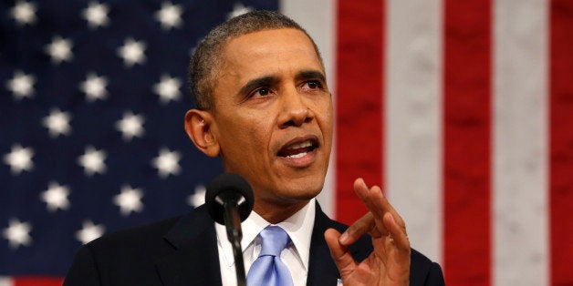 US President Barack Obama delivers the State of the Union address at the US Capitol in Washington on January 28, 2014. AFP PHOTO/Larry DOWNING/Pool (Photo credit should read LARRY DOWNING/AFP/Getty Images)