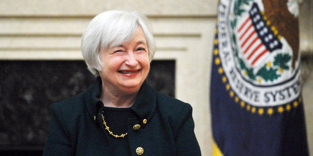 Janet Yellen smiles after taking the oath of office as Chairman of the Board of Governors of the Federal Reserve System February 3, 2014 at the Eccles Building in Washington, DC. Yellen takes her post as the first female chair of the Fed. AFP PHOTO/Mandel NGAN (Photo credit should read MANDEL NGAN/AFP/Getty Images)