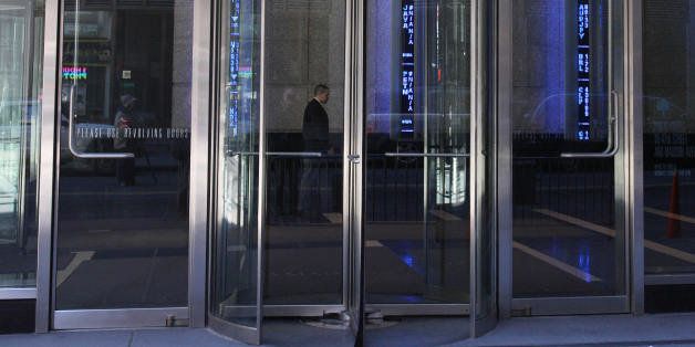 A revolving door at the Bear Stearns headquarters in New York outside the offices of global investment bank, securities trading and brokerage firm Bear, Stearns & Co. on Madison Ave on March 17, 2008 in New York. JP Morgan Chase bought Bear, Stearns & Co, for 2 USD a share, with help of 30,000 billion USD in financing of Bear, Stearns assets from the US Federal Reserve.AFP PHOTO/DON EMMERT (Photo credit should read DON EMMERT/AFP/Getty Images)