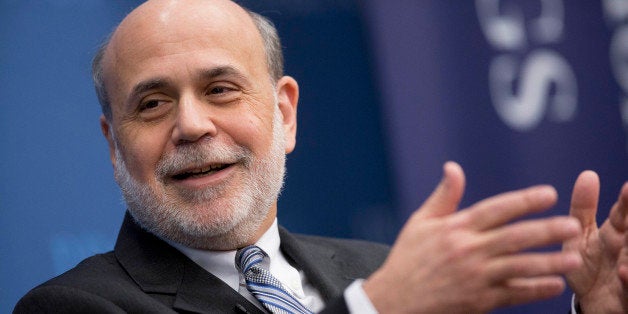 Ben S. Bernanke, chairman of the U.S. Federal Reserve, speaks during a discussion at the Brookings Institution in Washington, D.C., U.S., on Thursday, Jan. 16, 2014. Bernanke defended quantitative easing, saying it has helped the economy while posing little risk of inflation. Photographer: Andrew Harrer/Bloomberg via Getty Images 