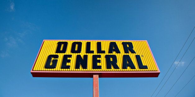 Dollar General Corp. signage is displayed outside of a store in Princeton, Illinois, U.S., on Tuesday, Sept. 3, 2013. Dollar General Corp. is scheduled to release earnings figures on Sept. 4. Photographer: Daniel Acker/Bloomberg via Getty Images