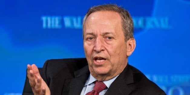 Former US Tresury Secretary Larry Summers addresses the Wall Street Journal CEO Council on November 19, 2013 in Washington,DC. The Wall Street Journal CEO Council annual meeting brings together the worlds most powerful chief executives to address the most pressing public policy and business issues of the day. AFP PHOTO/Nicholas KAMM (Photo credit should read NICHOLAS KAMM/AFP/Getty Images)