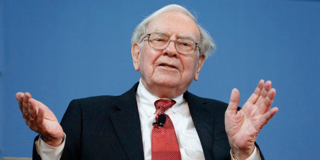 Warren Buffett, chief executive officer of Berkshire Hathaway Inc., speaks at an event to for Goldman Sachs Group Inc.'s 10,000 Small Businesses initiative in Detroit, Michigan, U.S., on Tuesday, Nov. 26, 2013. Goldman Sachs will provide capital for as much as $15 million in loans to small businesses in the Detroit area and also provide education and other assistance, according to a company statement today. Photographer: Jeff Kowalsky/Bloomberg via Getty Images
