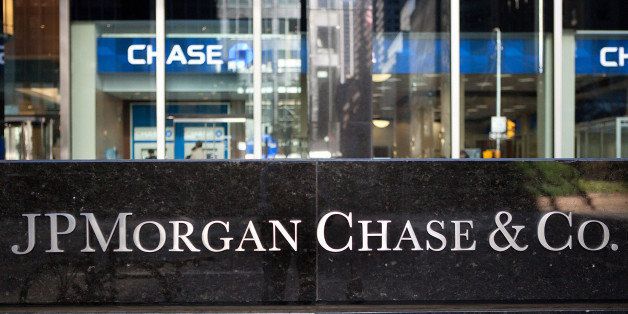 Signage is displayed outside of JPMorgan Chase & Co. headquarters in New York, U.S., on Wednesday, Oct. 13, 2010. JPMorgan said profit rose 23%, exceeding analysts' estimates, as provisions for bad loans shrank. Photographer: JB Reed/Bloomberg via Getty Images