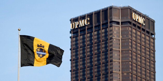 PITTSBURGH, PA - MAY 03: The city of Pittsburgh flag flies with the US Steel Tower in the background during the game between the Pittsburgh Pirates and the Washington Nationals during the game on May 3, 2013 at PNC Park in Pittsburgh, Pennsylvania. (Photo by Justin K. Aller/Getty Images)