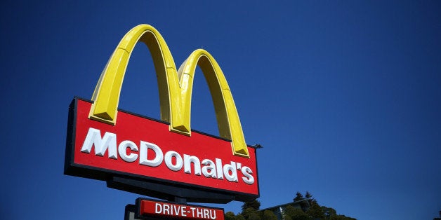 MILL VALLEY, CA - MARCH 12: A sign is posted in front of a McDonald's restaurant on March 12, 2013 in Mill Valley, California. McDonald's has retained its number one ranking in both global and domestic sales and continues to be the largest single restaurant brand in the world with company-store sales last year of $4.53 billion and franchise-store sales of $31.063 billion for a domestic total of $35.59 billion. (Photo by Justin Sullivan/Getty Images)