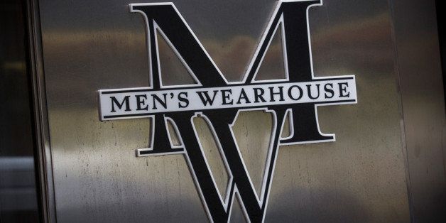 NEW YORK, NY - JANUARY 06: A Men's Warehouse storefront is seen on January 6, 2014 in New York City. Men's Warehouse is currently pursuing a hostile takeover of competitor Jos. A. Bank, which also sells men's suits and buisness wear. (Photo by Andrew Burton/Getty Images)