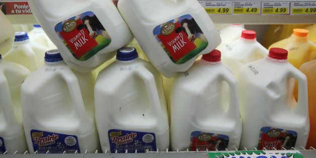 CHICAGO, IL - DECEMBER 27: Milk is offered for sale at a grocery store on December 27, 2012 in Chicago, Illinois. Milk prices could spike to $6 to $8 a gallon in January if lawmakers fail to reach a 'fiscal cliff' deal and renew a Farm Bill that's been in place since 2008 and sets the price at which the government buys milk. (Photo by Scott Olson/Getty Images)
