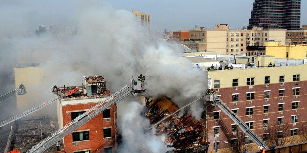 NEW YORK, NY - MARCH 12: In this image handout provided by the Office of Mayor of New York, firefighters from the Fire Department of New York (FDNY) respond to a five-alarm fire and building collapse at 1646 Park Ave in the Harlem neighborhood of Manhattan March 12, 2014 in New York City. Reports of an explosion were heard before the collapse of two multiple-dwelling buildings at East 116th St. and Park Avenue that left at least 17 injured and a number of people are missing. (Photo by Rob Bennett/Office of Mayor of New York/Getty Images)