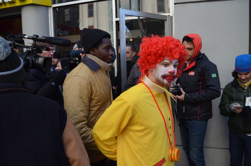 Protestors arrest a mock Ronald at the McDonald's at 341 5th Avenue in New York City.