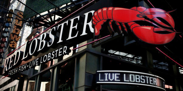 Red Lobster signage is displayed outside of a restaurant location in New York, U.S., on Wednesday, Sept. 19, 2012. Darden Restaurants Inc., operators of casual dining restaurants in North America, is scheduled to release earnings data on Sept. 21. Photographer: Victor J. Blue/Bloomberg via Getty Images