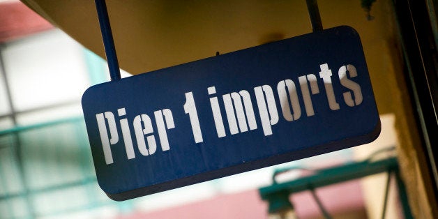 Pier 1 Imports Inc. signage is displayed outside of a store in San Francisco, California, U.S., on Tuesday, Sept. 17, 2013. P