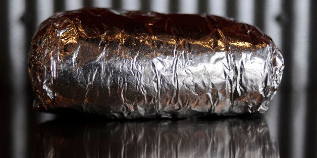 A Chipotle burrito in it's signature aluminum wrap on Friday, February 12, 2010. Burrito was that the original location on E. Evans Ave. Cyrus McCrimmon, The Denver Post (Photo By Cyrus McCrimmon/The Denver Post via Getty Images)