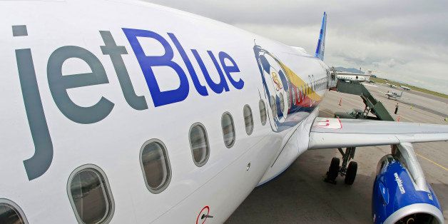 SALT LAKE CITY, UT - JUNE 12: A Jet Blue plane is branded with the Real Salt Lake Logo at the Salt Lake International Airport June 12, 2009 in Salt Lake City, Utah. Real is the first American major soccer team to have a plane branded with it's name a logo. (Photo by George Frey/MLS via Getty Images)