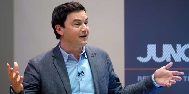 French economist Thomas Piketty speaks to students and guests during a presentation at King's College, central London, on April 30, 2014. Piketty said that he hoped to create a 'more informed fight' about the issue of income inequality as he launched his bestselling and highly controversial book in Britain. AFP PHOTO / LEON NEAL (Photo credit should read LEON NEAL/AFP/Getty Images)