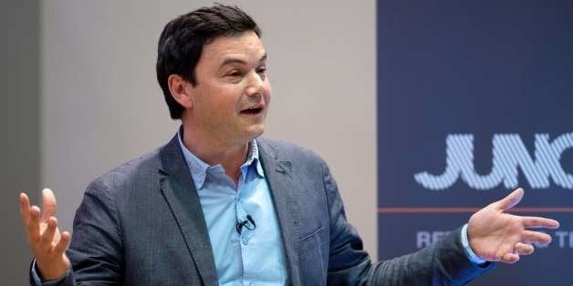 French economist Thomas Piketty speaks to students and guests during a presentation at King's College, central London, on Apr