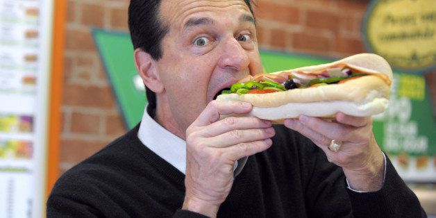 US sandwich maker Subway co-founder and chairman for the world, the self-made billionaire Fred DeLuca, poses with a sandwich in a Parisian Subway restaurant on June 17, 2011 prior to attend a meeting with the press as part of the 10th anniversary of Subway France. Subway has seen its number of restaurants balloon to 33,749 across the globe as of January 1, making it the world's largest fast food chain ahead of McDonald, with 32,737 restaurants, as reported on March 11, 2011. AFP PHOTO ERIC PIERMONT (Photo credit should read ERIC PIERMONT/AFP/Getty Images)