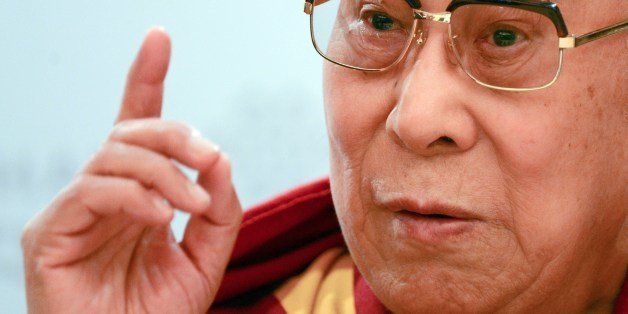 Tibetan spiritual leader, the Dalai Lama speaks during a press conference in Frankfurt/Main, western Germany on May 14, 2014. The Dali Lama is on a four-day-visit to Frankfurt. AFP PHOTO / ARNE DEDERT GERMANY OUT (Photo credit should read ARNE DEDERT/AFP/Getty Images)