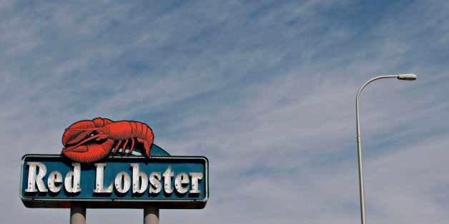 Darden Restaurants Inc. Red Lobster signage is displayed outside of a location in Peoria, Illinois, U.S., on Tuesday, March 18, 2014. Darden Restaurants Inc. is scheduled to release earnings figures on March 21. Photographer: Daniel Acker/Bloomberg via Getty Images