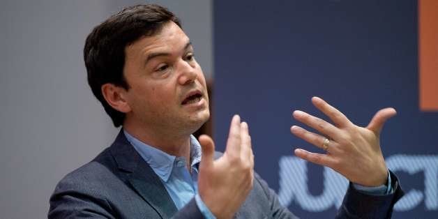 French economist Thomas Piketty speaks to students and guests during a presentation at King's College, central London, on Apr