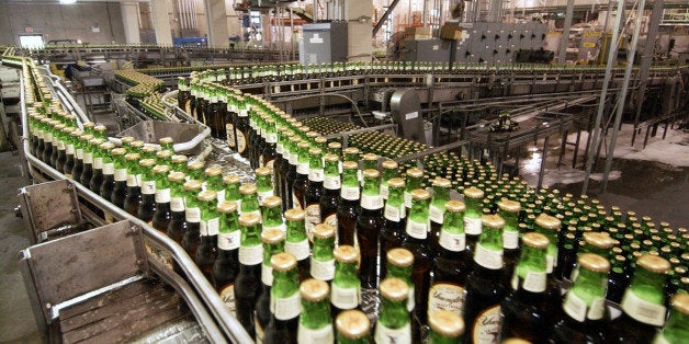 UNITED STATES - JUNE 29: Bottles of lager move through the assembly line at the Yuengling brewery in Pottsville, Pennsylvania, Wednesday, June 29, 2005. The U.S. economy grew at a 3.8 percent annual rate from January through March, matching the pace in the previous three months and suggesting Federal Reserve policy makers will keep raising interest rates. (Photo by Mike Mergen/Bloomberg via Getty Images)