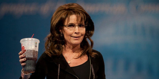 UNITED STATES - MARCH 16: Former Governor of Alaska Sarah Palin drinks a 'Big Gulp' soda to mock the soda law in New York during the 2013 Conservative Political Action Conference at the Gaylord National Resort & Conference Center at National Harbor, Md., on Saturday, March 16, 2013.(Photo By Douglas Graham/CQ Roll Call)